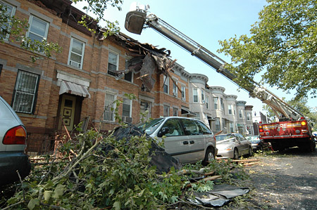 FDNY members respond to the widespread damage in Brooklyn following the storm on August 8.