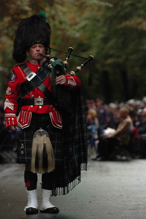The Emerald Society Pipes and Drums band honors the 10 active FDNY members who have died in the last year.