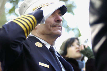 Chief of Department and military veteran Salvatore Cassano pays tribute to America's veterans during a wreath laying ceremony in Madison Square Park.