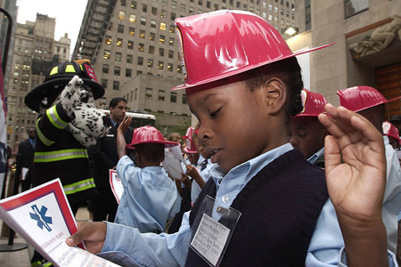 FDNY members joined second-grade students from Brooklyn at Rockefeller Center to celebrate Fire Prevention Week on October 9.