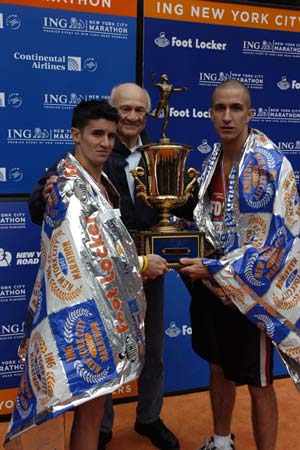 FDNY members celebrate their Mayor's Cup win at the ING New York City Marathon with Fire Commissioner Nicholas Scoppetta.