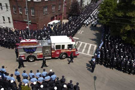 Thousands of firefighters, family members and friends lined the streets to pay their respects to Firefighter Daniel Pujdak of Ladder 146, who made the Supreme Sacrifice while operating at an all-hands fire in Brooklyn on June 21.