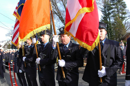 Thousands saluted the life of Lt. John Martinson during his funeral at Church of St. Clare on January 8.