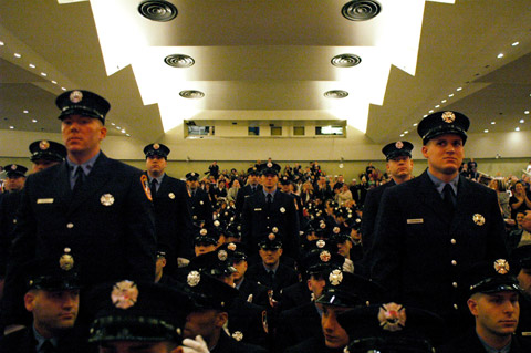 Probationary firefighters who served in the military are recognized during Proby Graduation on January 16.