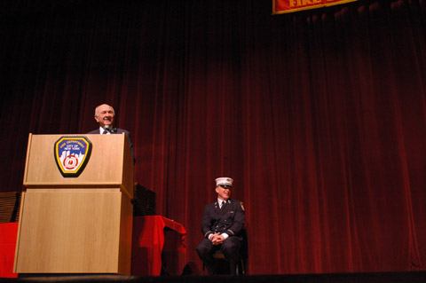 Fire Commissioner Nicholas Scoppetta addresses the crowd during Proby Graduation.