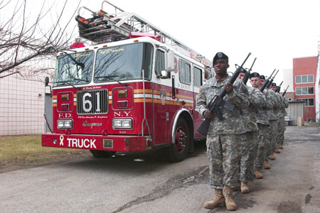 Ladder 61 was parked behind the 69th Infantry during the 21-gun salute to honor Firefighter Christian Engeldrum, who was killed in 2004 while serving with the Army National Guard in Iraq.
