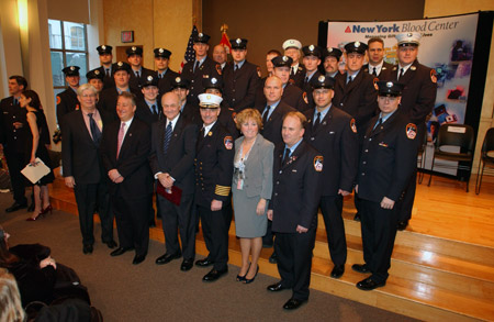 Fire Commissioner Nicholas Scoppetta, Chief of Department Salvatore Cassano, Director of the Bureau of Health Services Mary T. McLaughlin, President and CEO of the NY Blood Center Dr. Robert Jones and Chairman of the Board of Trustees for the NY Blood Center Howard Milstein join the 16 firefighters honored for donating bone marrow in 2007.
