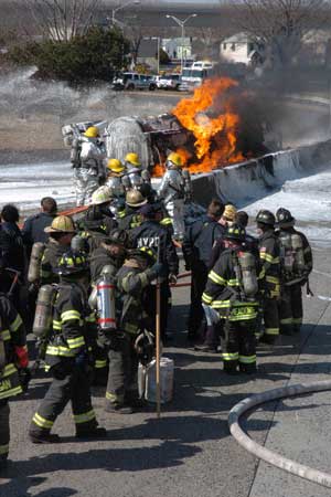 A 9,000-gallon gas truck overturned and burst into flames at around 1215 hours. Approximately 280 firefighters used a special alcohol-based foam to douse the flames. The fire was deemed under control in approximately two hours. The driver of the tanker was killed by the extreme conditions.
