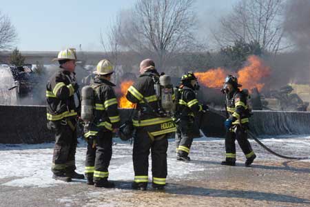 A 9,000-gallon gas truck overturned and burst into flames at around 1215 hours. Approximately 280 firefighters used a special alcohol-based foam to douse the flames. The fire was deemed under control in approximately two hours. The driver of the tanker was killed by the extreme conditions.