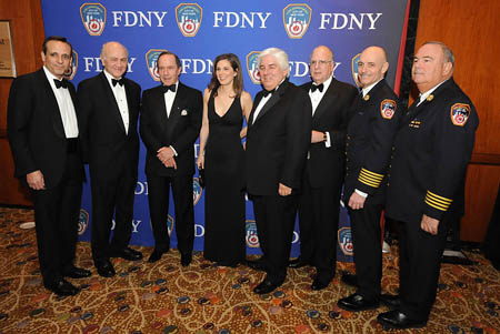 The FDNY Foundation's annual Humanitarian Awards Dinner on March 13. (L to R) FDNY Foundation Vice Chair Andrew Guarino, Fire Commissioner Nicholas Scoppetta, Honoree Mort Zuckerman, Awards Emcee Erin Burnett, Honoree Martin Sullivan, Chairman of the FDNY Foundation Steve Ruzzo, Chief of Department Salvatore Cassano and Chief of Operations Patrick McNally.