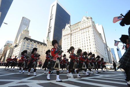 Emerald Society Pipes and Drums Band marches up Fifth Avenue during the 247th Annual St. Patrick's Day Parade.