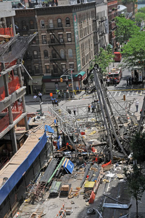 1581 - A piece of the crane fell from a building under construction at 333 East 91 Street, killing two construction workers and critically injuring another.