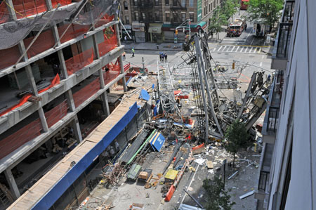 1570 - The apartment building across the street - 354 East 91 Street - was damaged as the crane fell. Seven nearby buildings were evacuated after the collapse. 