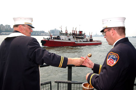 FDNY Chaplains Monsignor John Delendick (left) and Reverend Stephen Harding blessed seven fireboats, saying, &ldquo;May you always have calm seas and fair winds.&rdquo;