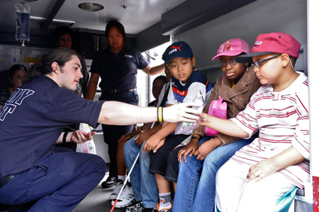Students got to see and touch the equipment used by FDNY EMTs during Emergency Safety Day.