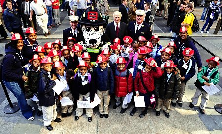 Second graders from Achievement First Crown Heights Elementary joined Fire Commissioner Nicholas Scoppetta, Chief of Department Salvatore Cassano and Chief of Operations Patrick McNally kick off Fire Prevention Week 2008 in Rockefeller Center.