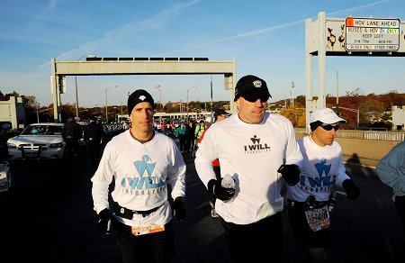 (L to R) Noel Flynn, Firefighter Matt Long and Lt. Frank Carino cross the Verrazano-Narrows Bridge.