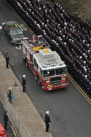 FDNY members line Castleton Avenue in Staten Island to pay their respects to Lt. Robert J. Ryan of Engine 155