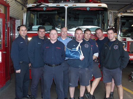 Members of Ladder 116, (L to R) FF Mike Schreiber, FF Chris DiMaria, FF Brian Connelly, Lt. Bill Kelly, FF Eric Gehm, FF Terence Drew, FF Ryan Murphy and FF Dan Lawlor.