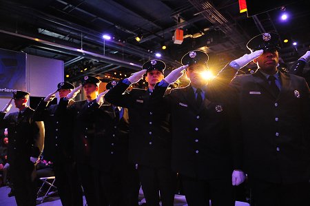 The firefighters graduated during a ceremony aboard the U.S.S. Intrepid.