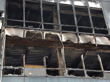 The fast-moving fire melted the window support beams.