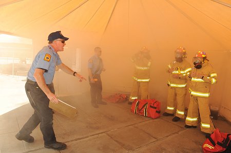 Members put on their Personal Protective Equipment to keep them safe when entering hazardous conditions.