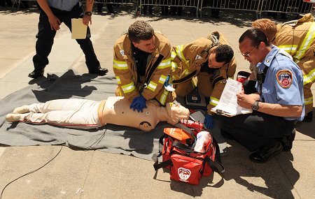Members perform CPR on a simulated patient that has gone into cardiac arrest.