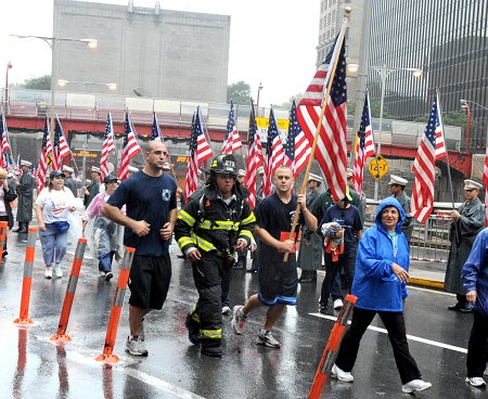 A firefighter completes the Tunnel to Towers run in full bunker gear, like Stephen Siller did on Sept. 11, 2001.