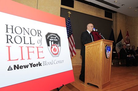 Fire Commissioner Salvatore Cassano welcomes the crowd to the sixth annual Honor Roll of Life ceremony.