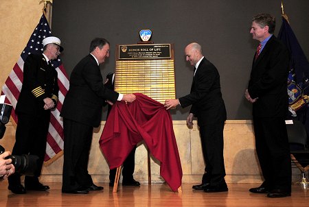 The Honor Roll of Life plaque is unveiled, listing the names of 10 firefighters who donated bone marrow and stem cells in 2009. (L to R) Chief of Department Edward Kilduff, Chairman of NYBC’s Board of Trustees Howard Milstein, Fire Commissioner Salvatore Cassano and NYBC President and CEO Dr. Christopher Hillyer.