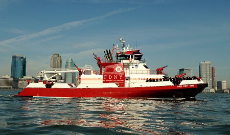 The Three Forty Three as it leads military vessels up the Hudson River to kick off Fleet Week.