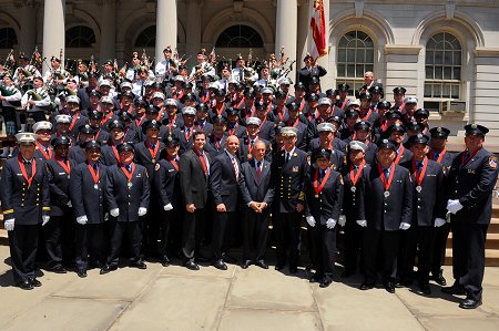 The 2010 Medal Day recipients with Mayor Bloomberg, Fire Commissioner Salvatore Cassano and Chief of Department Edward Kilduff.