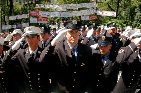 The Medal Day recipients. Hanging behind them are banners of support and congratulations provided by the members of their fire companies and EMS stations.