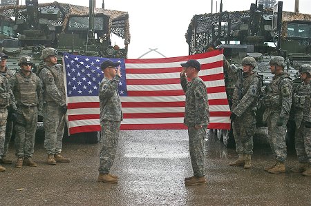 Members of the U.S. Army were sworn in beside the American flag the firefighters sent.