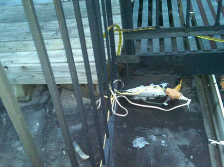 A view of a few of the unapproved electrical wiring on the roof of 240 E. Houston St.