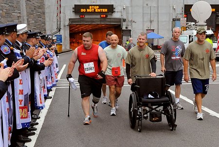 Fire Commissioner Salvatore Cassano runs with Wounded Warriors.