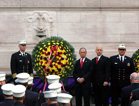 Mayor Michael Bloomberg, Fire Commissioner Salvatore Cassano, Chief of Department Edward Kilduff and Chief of EMS John Peruggia place three wreaths at the Firefighter's Monument. The wreaths are for members of the FDNY's Fire Service, members of the Emergency Medical Service and for the Department as a whole.
