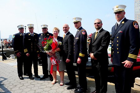 (L to R) Chief of Marine Division James Dalton, Chief of Department Edward Kilduff, FDNY Chaplain Monsignor John Delendick, Director of FDNY Special Events Lenore Koehler, Fire Commissioner Salvatore Cassano, Chief of Operations Robert Sweeney, CEO of SAFE Boats International Scott Peterson and Chief of Special Operations Command William Seelig.