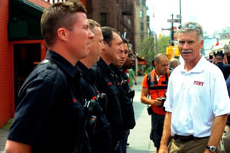 Chief of Department Edward Kilduff speaks with the members of Squad 18. The firehouse was one of the stops along the walk.
