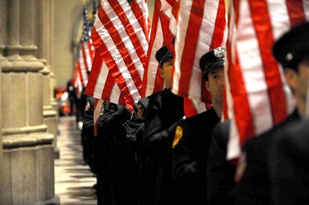 FDNY members carried 343 American flags into the service, representing the 343 members killed on Sept. 11, 2001.