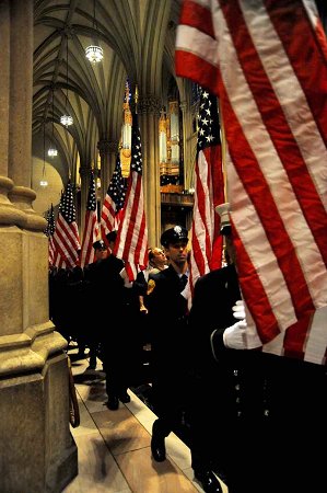 FDNY members carried 343 American flags into the service, representing the 343 members killed on Sept. 11, 2001.