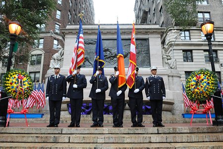 The Honor Guard in front of the Fireman's Monument on Riverside Drive.
