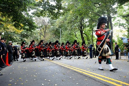 The Emerald Society Pipes and Drums Band.