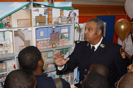 Teaching children about fire hazards in the home.
