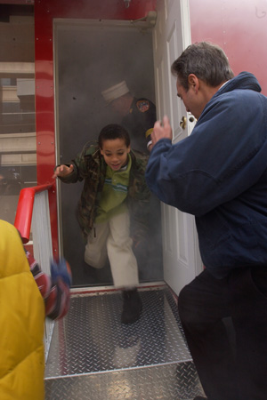 Children learning how to escape in case of fire.