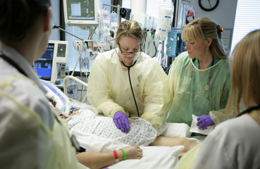 Doctors treat a patient in Bellevue Hospital's Emergency Department.