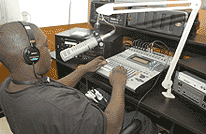 Photo of person on radio station