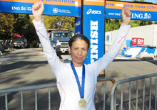 Elizabeth Guzman at the finish line of the 2011 ING NYC Marathon