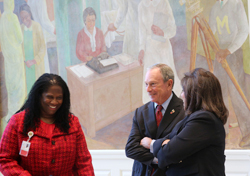 Mayor Bloomberg with Denise Soares and Iris Jimenez-Hernandez in front of the mural 'Pursuit of Happiness' by Vertis Hayes Mayor Bloomberg with Denise Soares and Iris Jimenez-Hernandez in front of the mural 'Pursuit of Happiness' by Vertis Hayes