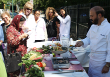 Chef at Coney Island Hospital farmers market demonstrates use of healthy ingredients. Chef at Coney Island Hospital farmers market demonstrates use of healthy ingredients.